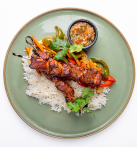 Grilled pork skewers with roasted tomato salsa
